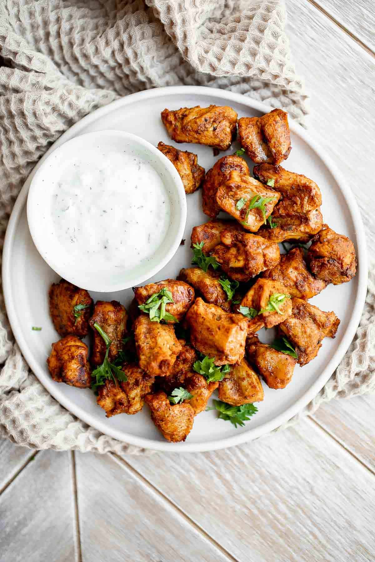 Air Fryer Tandoori Chicken Bites are juicy, tender, and loaded with authentic Indian spices. This quick easy air fryer recipe is perfect on busy weeknights. | aheadofthyme.com