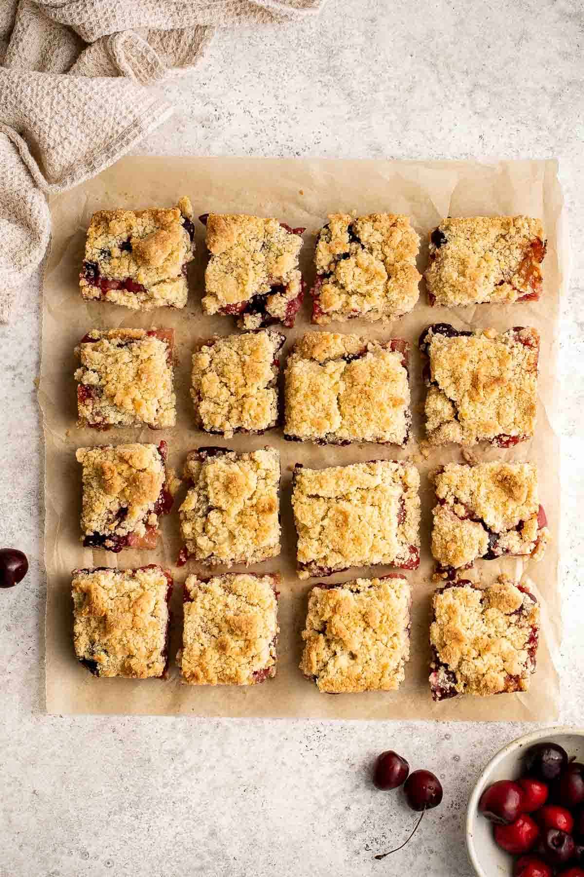 These bakery-style homemade Cherry Crumb Bars with 3 delicious layers are sweet, buttery, and tart. They’re easy to make and ready in just over an hour. | aheadofthyme.com