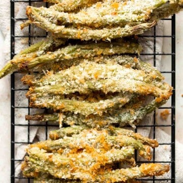 Baked green bean fries are flavorful, crispy, and nutritious. These veggies are quick and easy to make as a healthy appetizer, snack, or side dish. | aheadofthyme.com