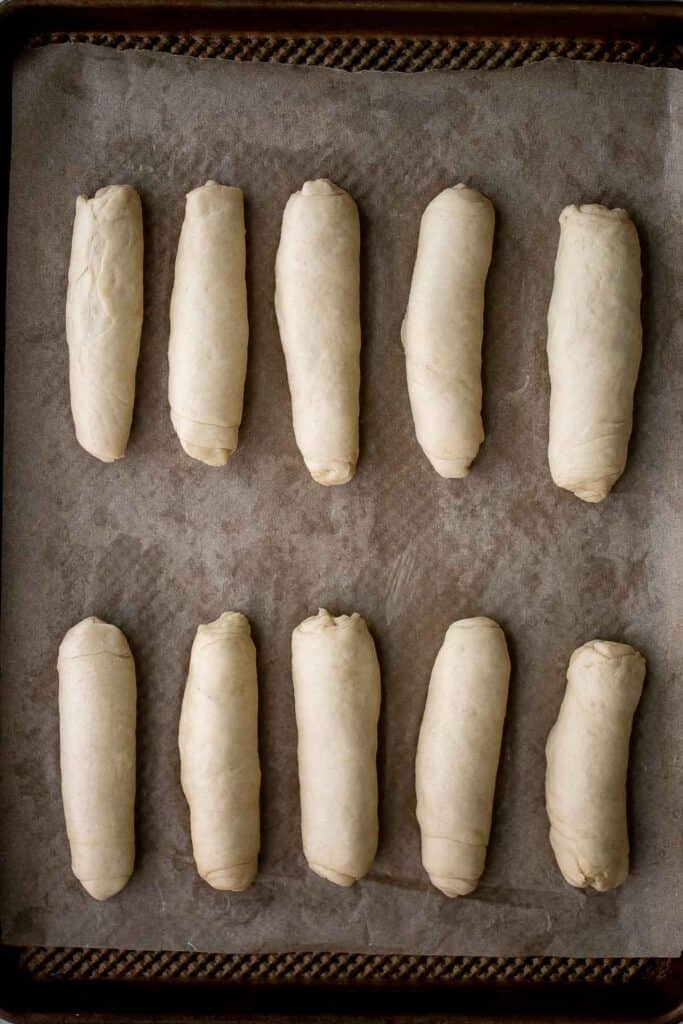 Homemade Hot Dog Buns are soft, fluffy, and airy inside with the perfect golden brown crust. This easy to make bread recipe takes just 30 minutes to prep. | aheadofthyme.com