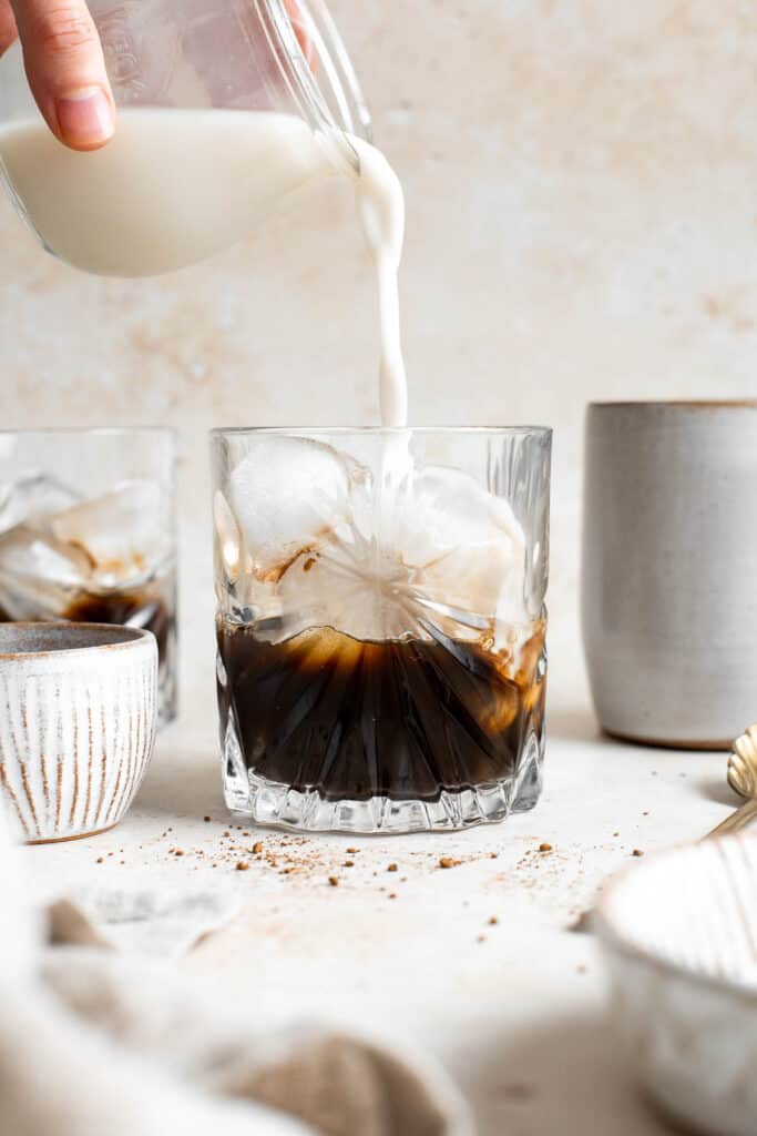 Homemade Iced Latte is refreshing, quick, and delicious. With just 3 simple ingredients and under 5 minutes, it’s the easiest drink you’ll make this summer. | aheadofthyme.com