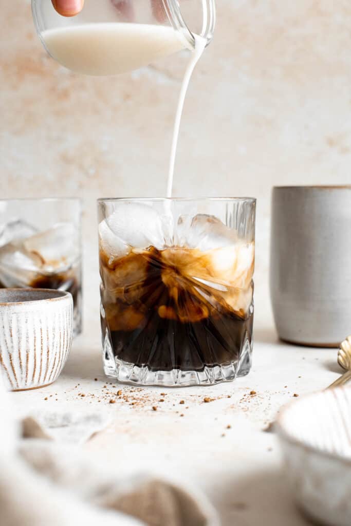Homemade Iced Latte is refreshing, quick, and delicious. With just 3 simple ingredients and under 5 minutes, it’s the easiest drink you’ll make this summer. | aheadofthyme.com