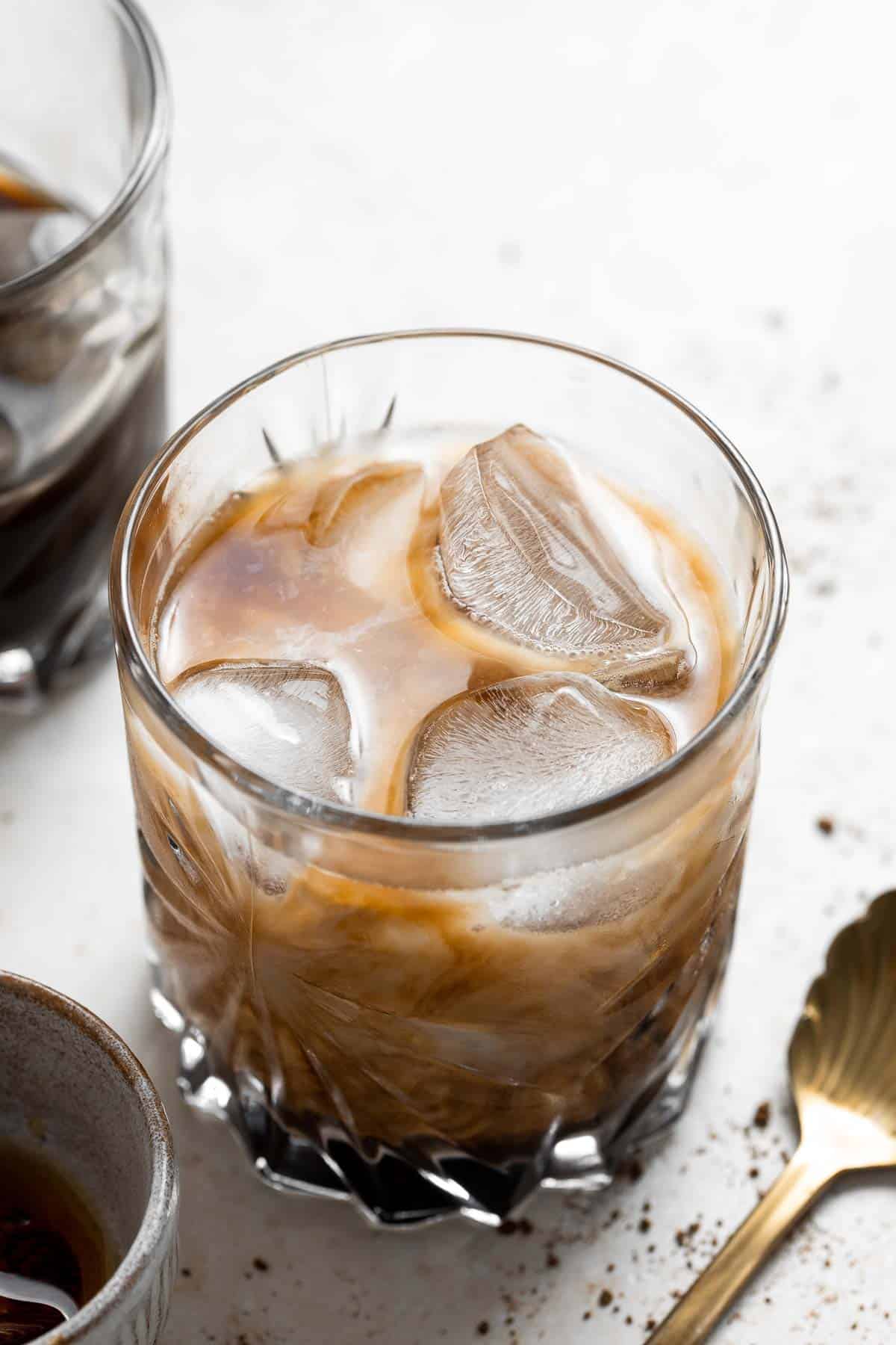 Homemade Iced Latte is refreshing, quick, and delicious. With just 3 simple ingredients and under 5 minutes, it’s the easiest drink you’ll make this summer. | aheadofthyme.com