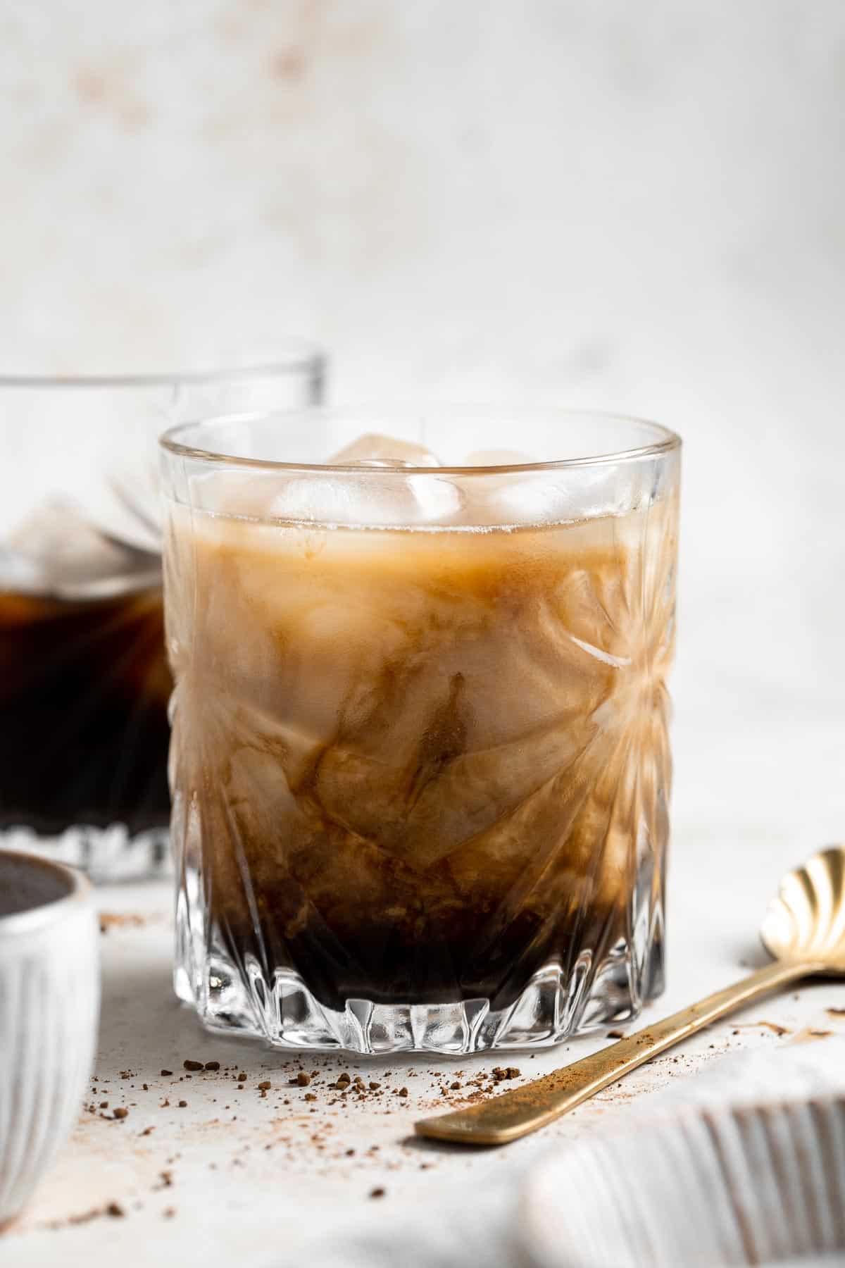 Homemade Iced Latte is refreshing, quick, and delicious. With just 3 simple ingredients and under 5 minutes, it’s the easiest drink you’ll make this summer. | aheadofthyme.com