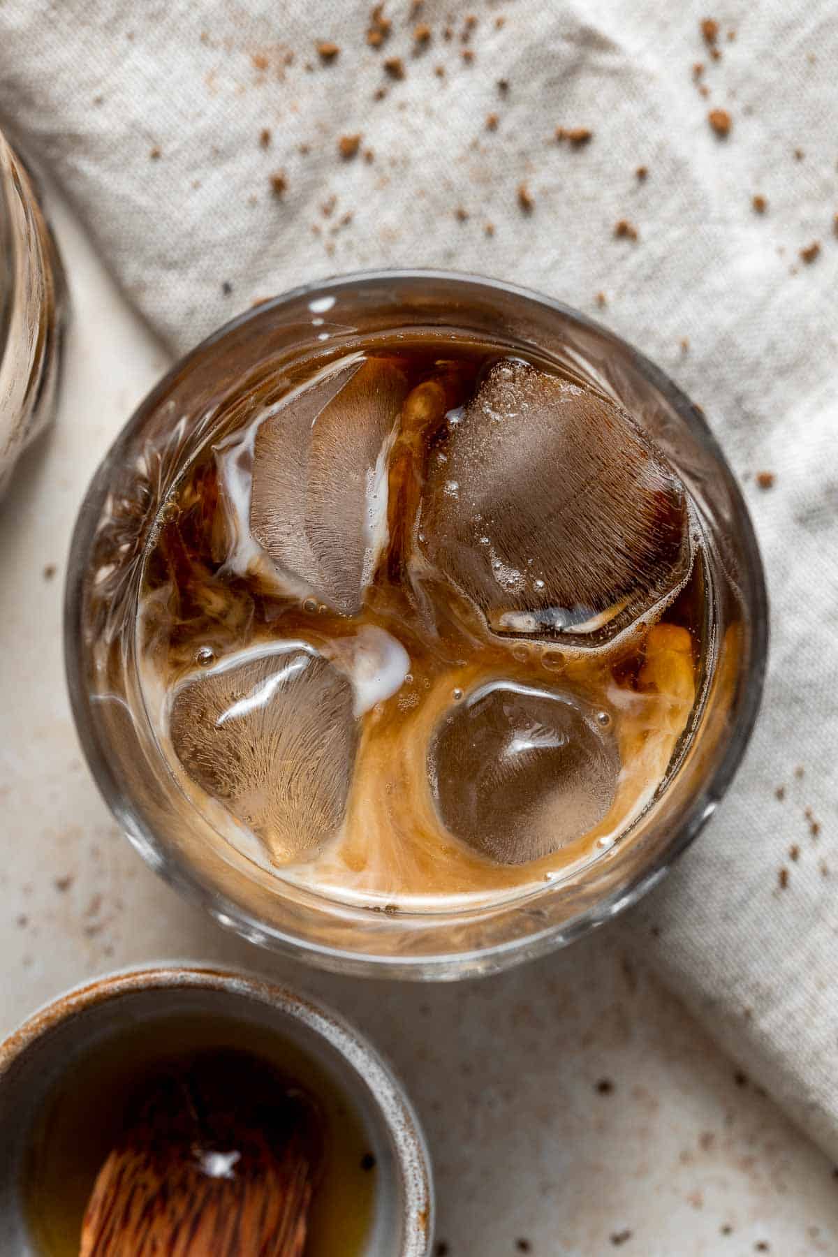 Homemade Iced Latte is refreshing, quick, and delicious. With just 3 simple ingredients and under 5 minutes, it’s the easiest drink you’ll make this summer. | aheadofthyme.com