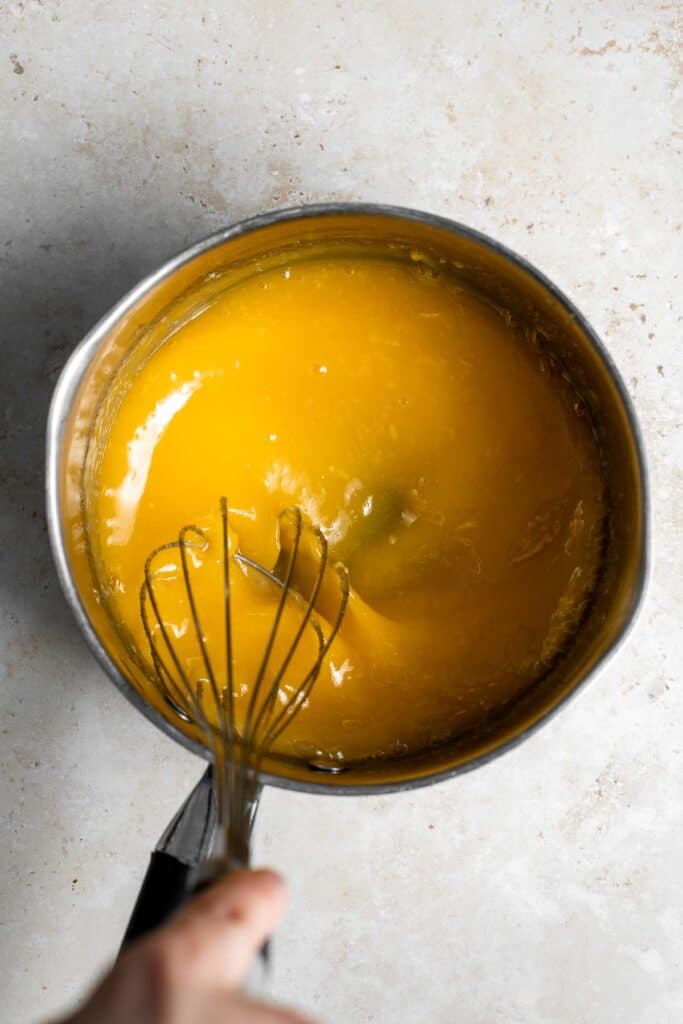 Homemade Lemon Curd is rich, creamy, sweet, and tangy. This delicious fruit curd is easy to make with just 6 simple ingredients and a few basic steps. | aheadofthyme.com