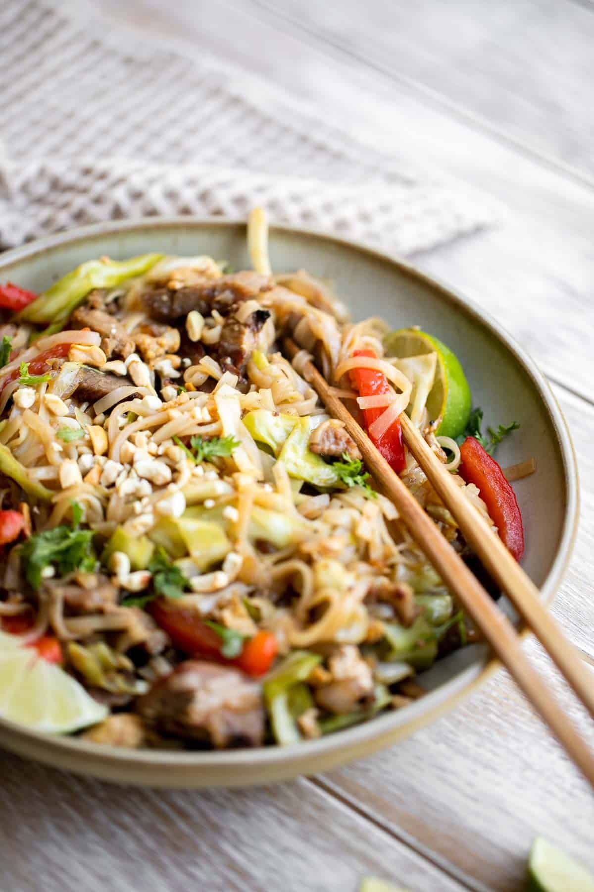 Pork Noodles is a quick and easy stir fry ready in just 20 minutes (including prep!). It’s filling, delicious, flavorful, and better than takeout. | aheadofthyme.com