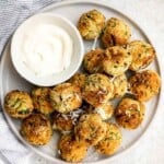 Zucchini Bites are savory balls that are loaded with fresh zucchini. They're quick and easy to make in under 30 minutes in the air fryer or oven. | aheadofthyme.com