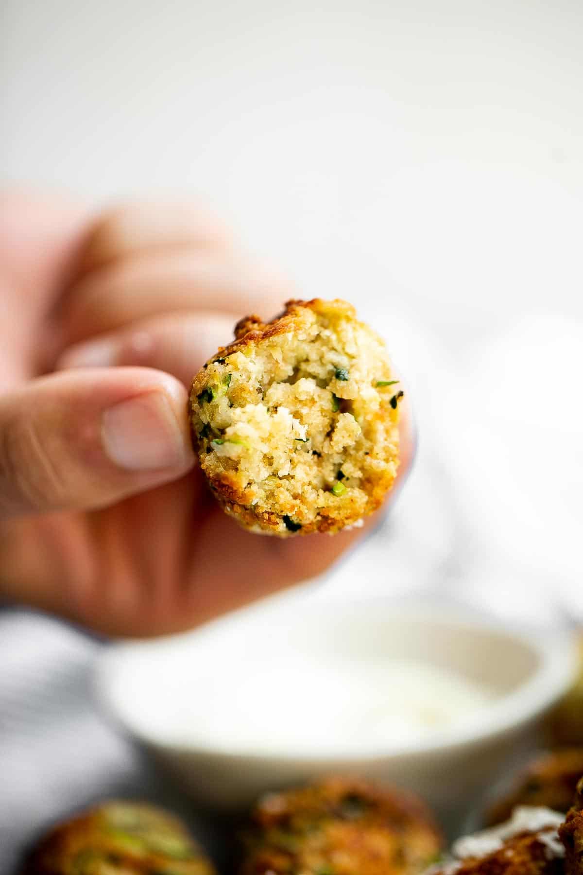 Zucchini Bites are savory balls that are loaded with fresh zucchini. They're quick and easy to make in under 30 minutes in the air fryer or oven. | aheadofthyme.com