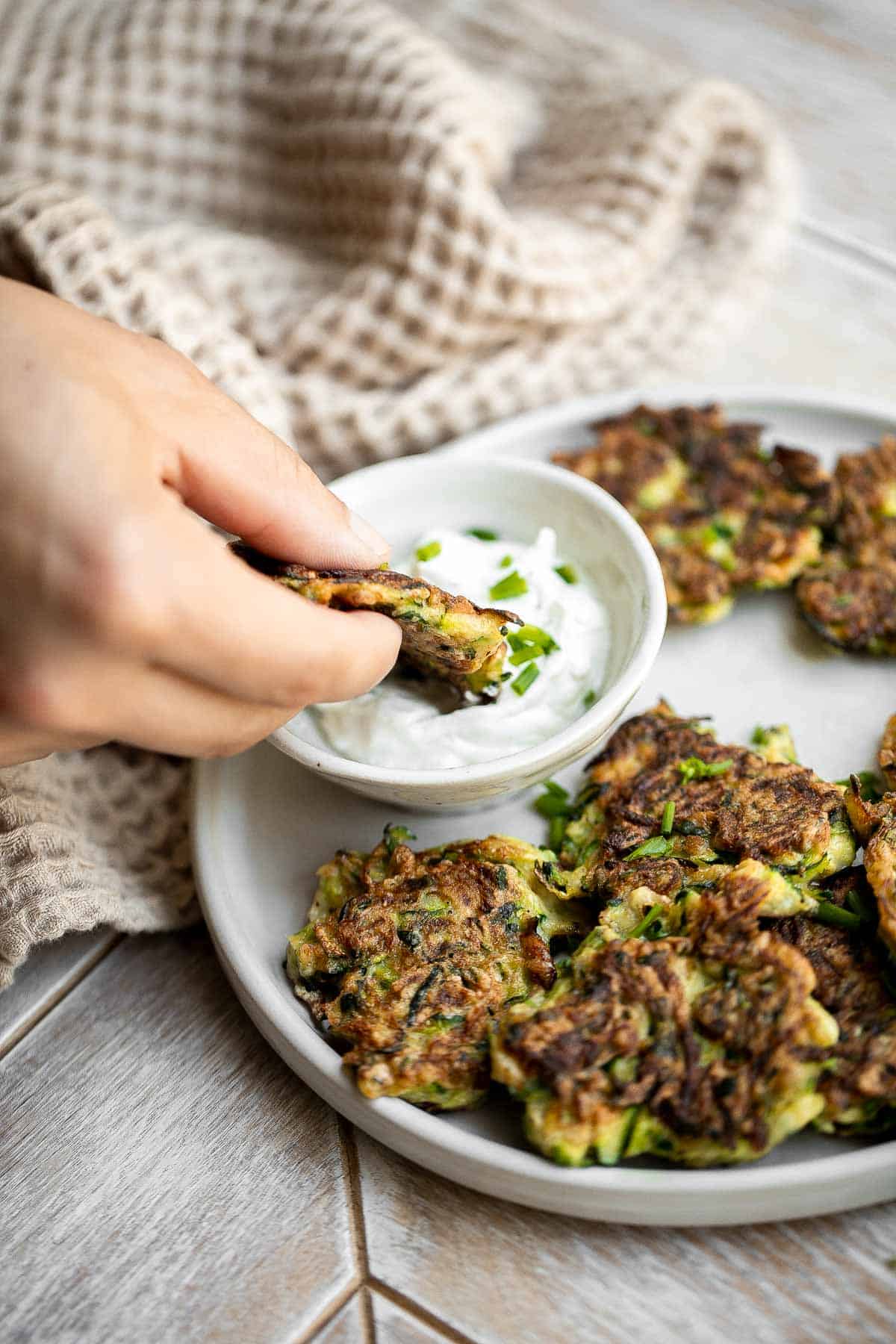 Zucchini fritters are crispy outside, tender inside, and loaded with zucchini. These healthy bites are one of my favorite ways to use up summer zucchini. | aheadofthyme.com