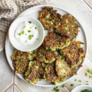 Zucchini fritters are crispy outside, tender inside, and loaded with zucchini. These healthy bites are one of my favorite ways to use up summer zucchini. | aheadofthyme.com