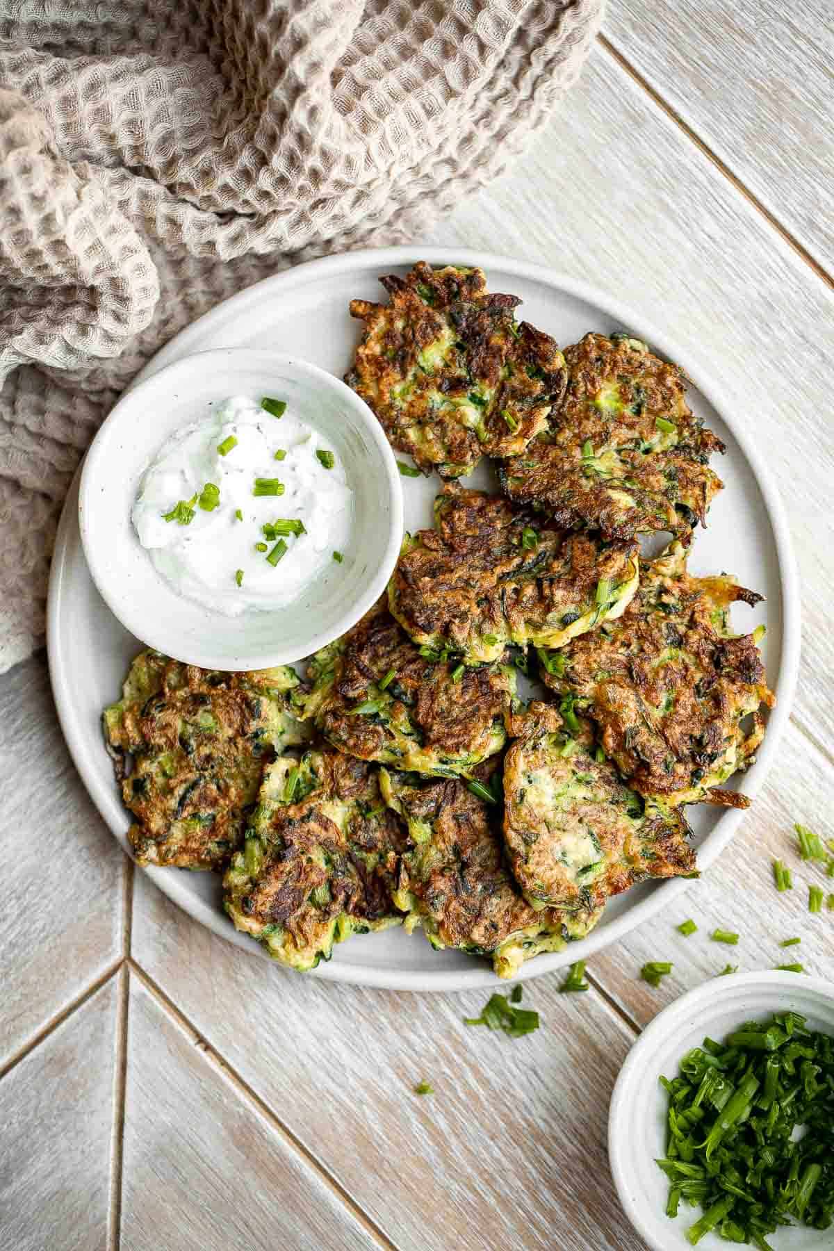 Zucchini fritters are crispy outside, tender inside, and loaded with zucchini. These healthy bites are one of my favorite ways to use up summer zucchini. | aheadofthyme.com