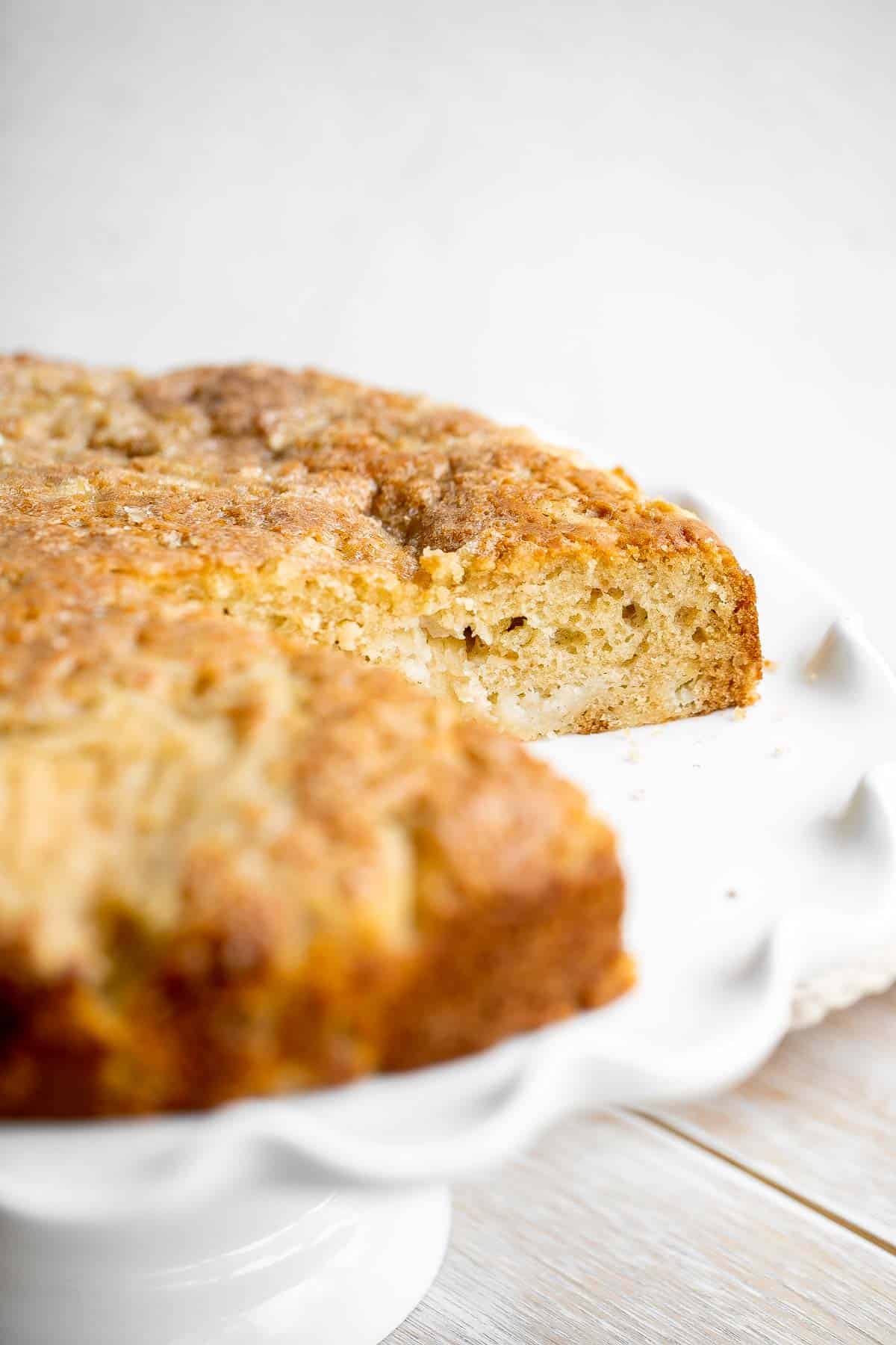 Easy Apple Cake has a dense and moist crumb and is loaded with fresh apples, cinnamon sugar, and nuts. It’s quick, easy, and ready to eat in under an hour. | aheadofthyme.com