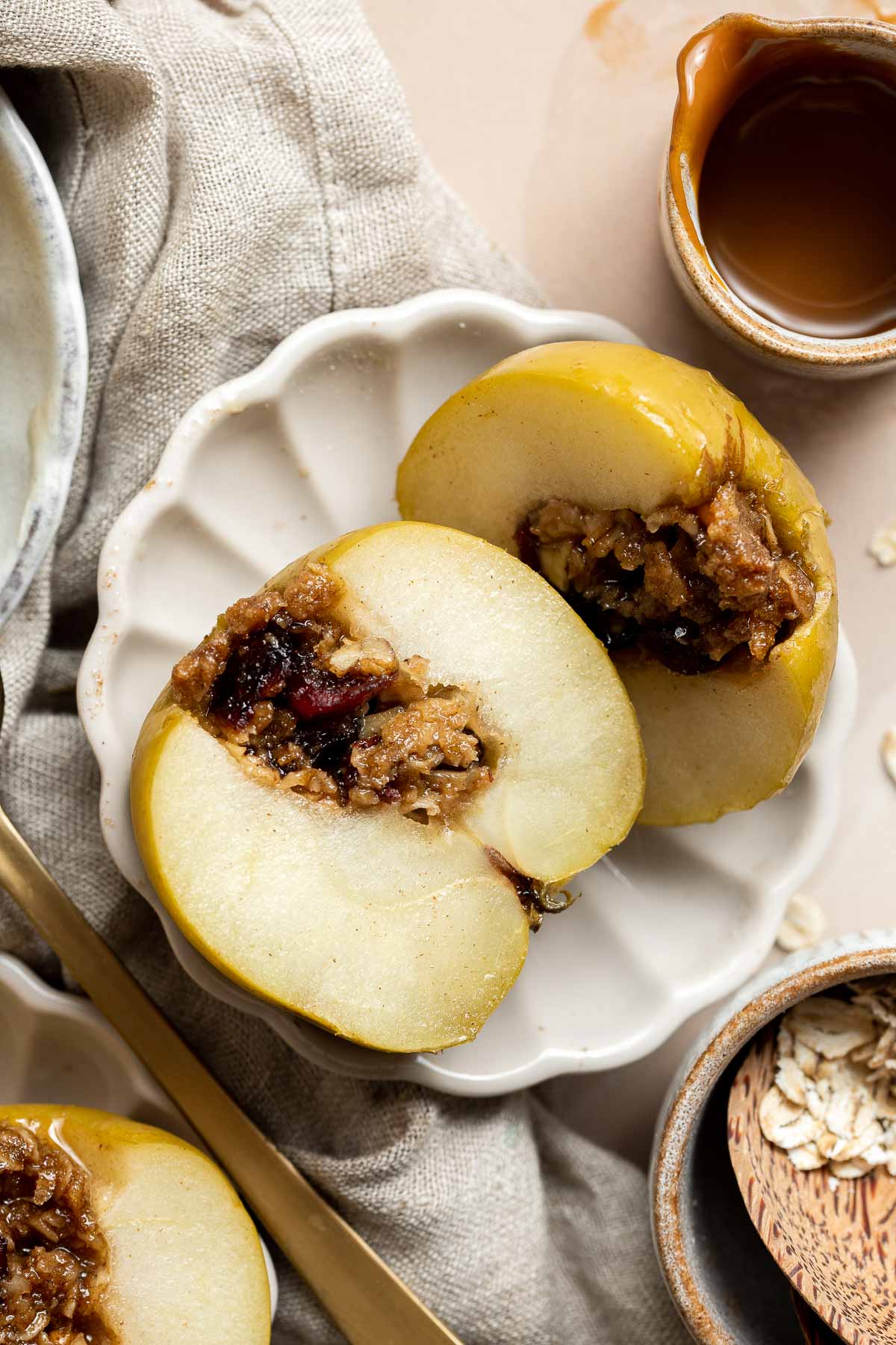 Baked Apples are soft, warm, and tender, with a crunchy sweet cinnamon oat filling. This cozy and comforting fall dessert is quick easy to make too. | aheadofthyme.com