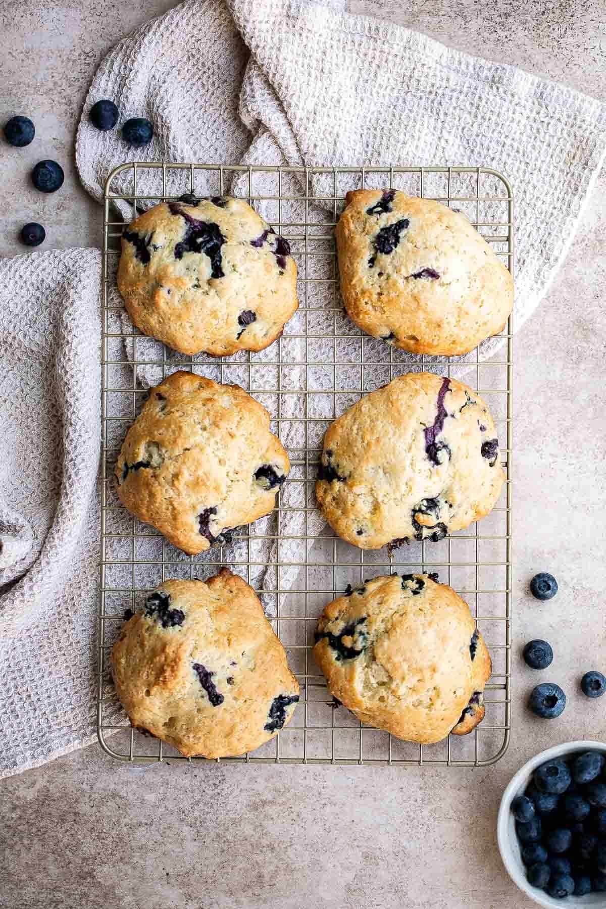 These Blueberry Biscuits from scratch are delicious, fluffy, moist, and sweet. It’s a one bowl recipe that is ready in 30 minutes with minimal clean up. | aheadofthyme.com