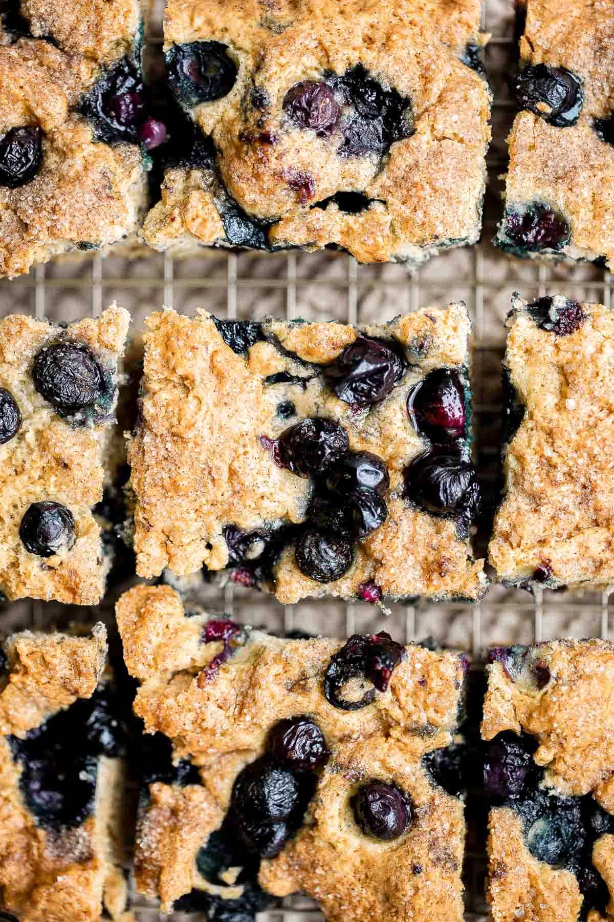 This Blueberry Cake is dense, moist, and chock-full of delicious blueberries with a dusting of cinnamon sugar on top. Prep this coffee cake in 10 minutes. | aheadofthyme.com