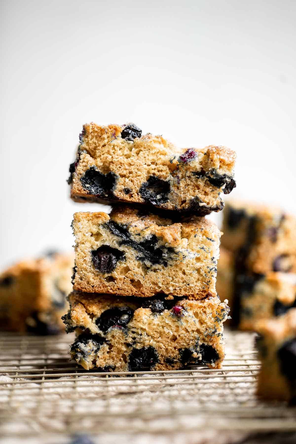 This Blueberry Cake is dense, moist, and chock-full of delicious blueberries with a dusting of cinnamon sugar on top. Prep this coffee cake in 10 minutes. | aheadofthyme.com