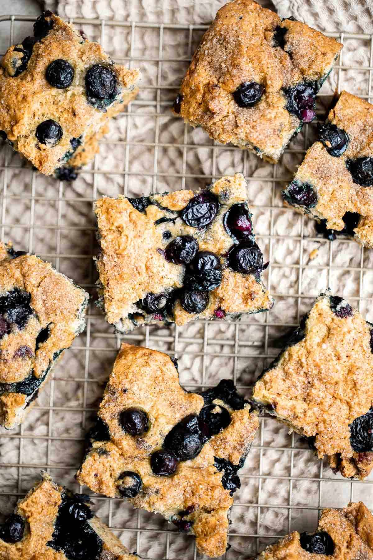 This Blueberry Cake is dense, moist, and chock-full of delicious blueberries with a dusting of cinnamon sugar on top. Prep this coffee cake in 10 minutes. | aheadofthyme.com