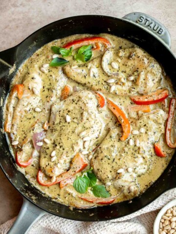 Creamy Pesto Chicken is a quick, 30 minute one-pan dinner with juicy chicken breasts in a rich, flavorful pesto sauce. Weeknight easy, date-night worthy. | aheadofthyme.com
