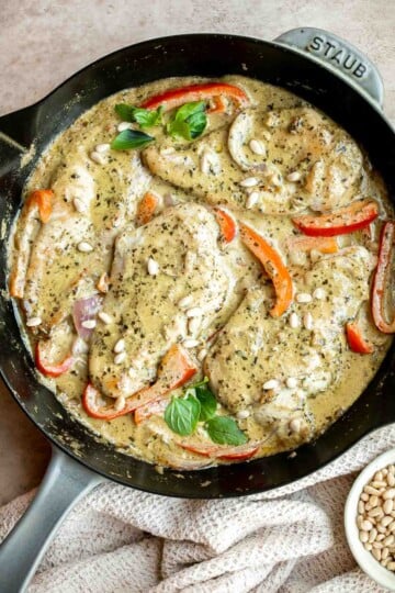 Creamy Pesto Chicken is a quick, 30 minute one-pan dinner with juicy chicken breasts in a rich, flavorful pesto sauce. Weeknight easy, date-night worthy. | aheadofthyme.com