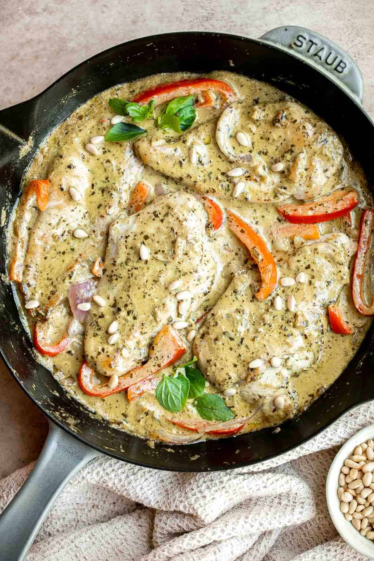 Creamy Pesto Chicken is a quick, 30 minute one-pan dinner with juicy chicken breasts in a rich, flavorful pesto sauce. Weeknight easy, date-night worthy. | aheadofthyme.com