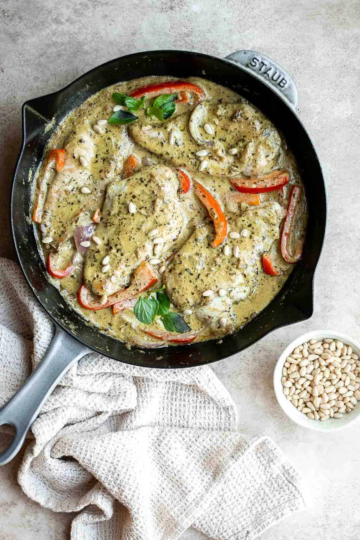 Creamy Pesto Chicken is a quick and easy 30 minute meal that needs to be on your family weeknight dinner rotation. It's rich, creamy, and delicious. | aheadofthyme.com