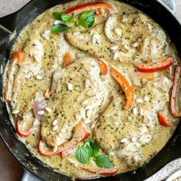 Creamy Pesto Chicken is a quick and easy 30 minute meal that needs to be on your family weeknight dinner rotation. It's rich, creamy, and delicious. | aheadofthyme.com