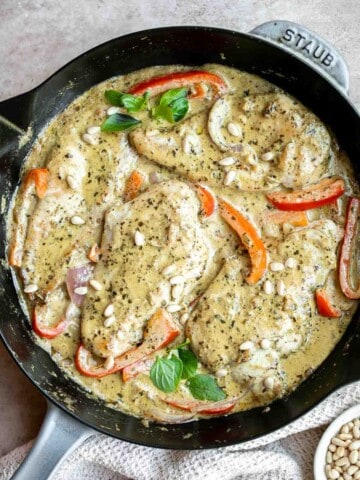Creamy Pesto Chicken is a quick and easy 30 minute meal that needs to be on your family weeknight dinner rotation. It's rich, creamy, and delicious. | aheadofthyme.com
