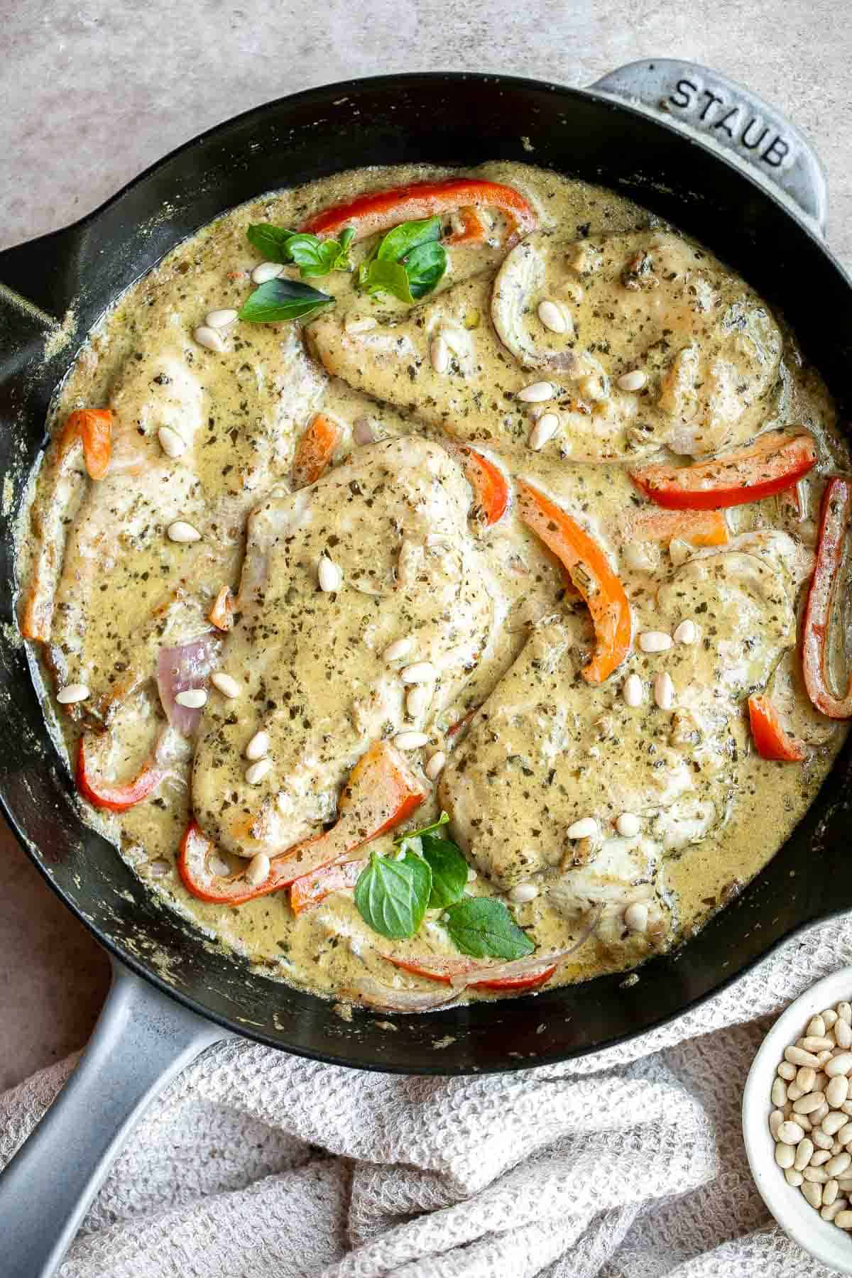 Creamy Pesto Chicken is a quick and easy 30 minute meal that needs to be on your family weeknight dinner rotation. It's rich, creamy, and delicious. | aheadofthyme.com