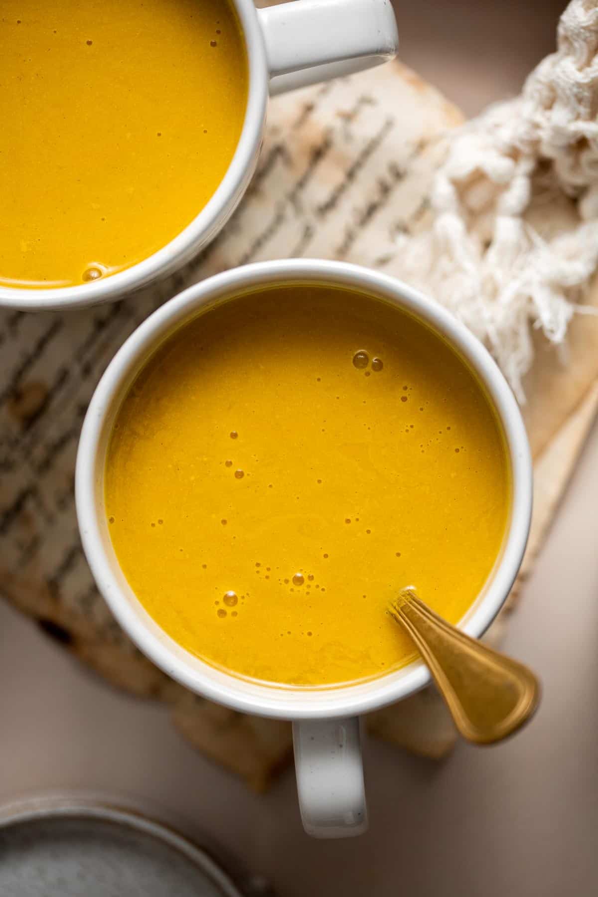 Golden Milk Turmeric Latte is an Indian herbal tea that is quick and easy to make, loaded with natural soothing properties, and great for immunity. | aheadofthyme.com