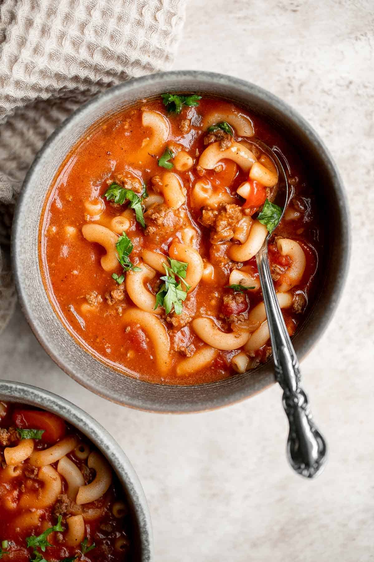 Hamburger soup with macaroni is a quick and easy weeknight dinner that‘s wholesome, filling, comforting and nutritious. Prep, cook and serve under an hour. | aheadofthyme.com