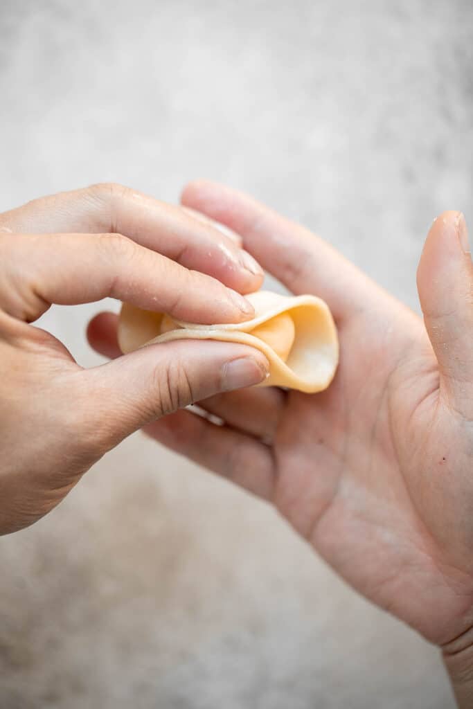 Homemade Potato and Cheese Perogies are comforting, delicious, and satisfying. These cheddar pierogi from scratch as easier to make than you think! | aheadofthyme.com