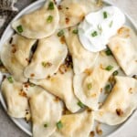 Homemade Potato and Cheese Perogies are comforting, delicious, and satisfying. These cheddar pierogi from scratch as easier to make than you think! | aheadofthyme.com