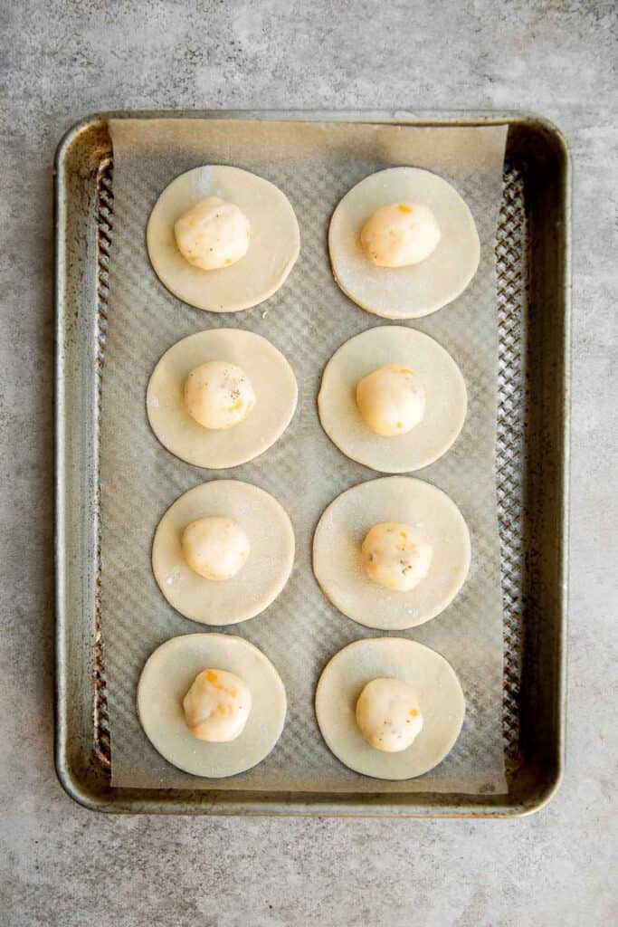 Homemade Potato and Cheese Perogies are comforting, delicious, and satisfying. These cheddar pierogi from scratch as easier to make than you think! | aheadofthyme.com