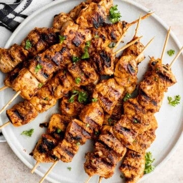 Italian Chicken Skewers are an easy, delicious, and flavorful grilled chicken dinner made with juicy chicken bites smothered in a herby tomato marinade. | aheadofthyme.com