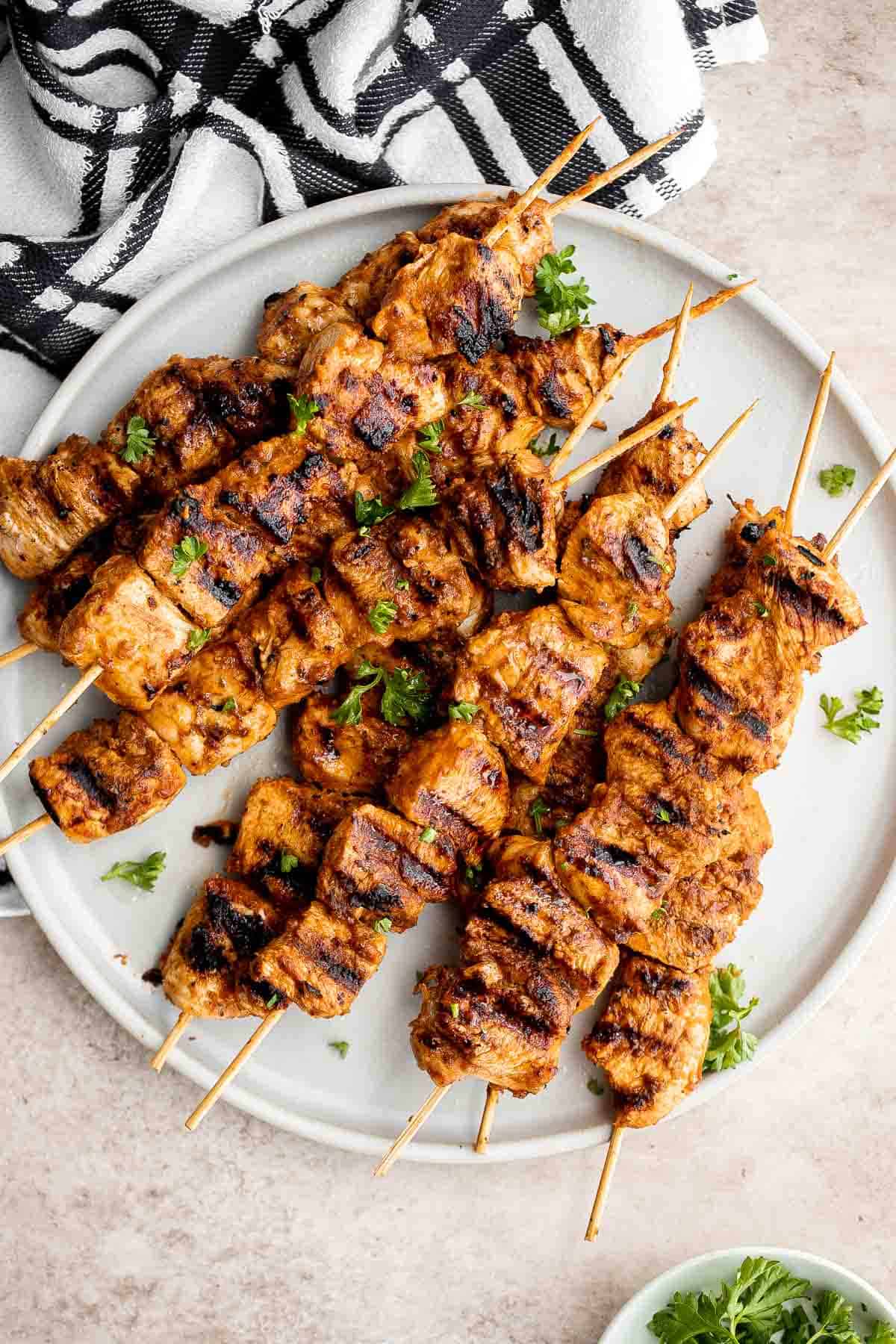 Italian Chicken Skewers are an easy, delicious, and flavorful grilled chicken dinner made with juicy chicken bites smothered in a herby tomato marinade. | aheadofthyme.com