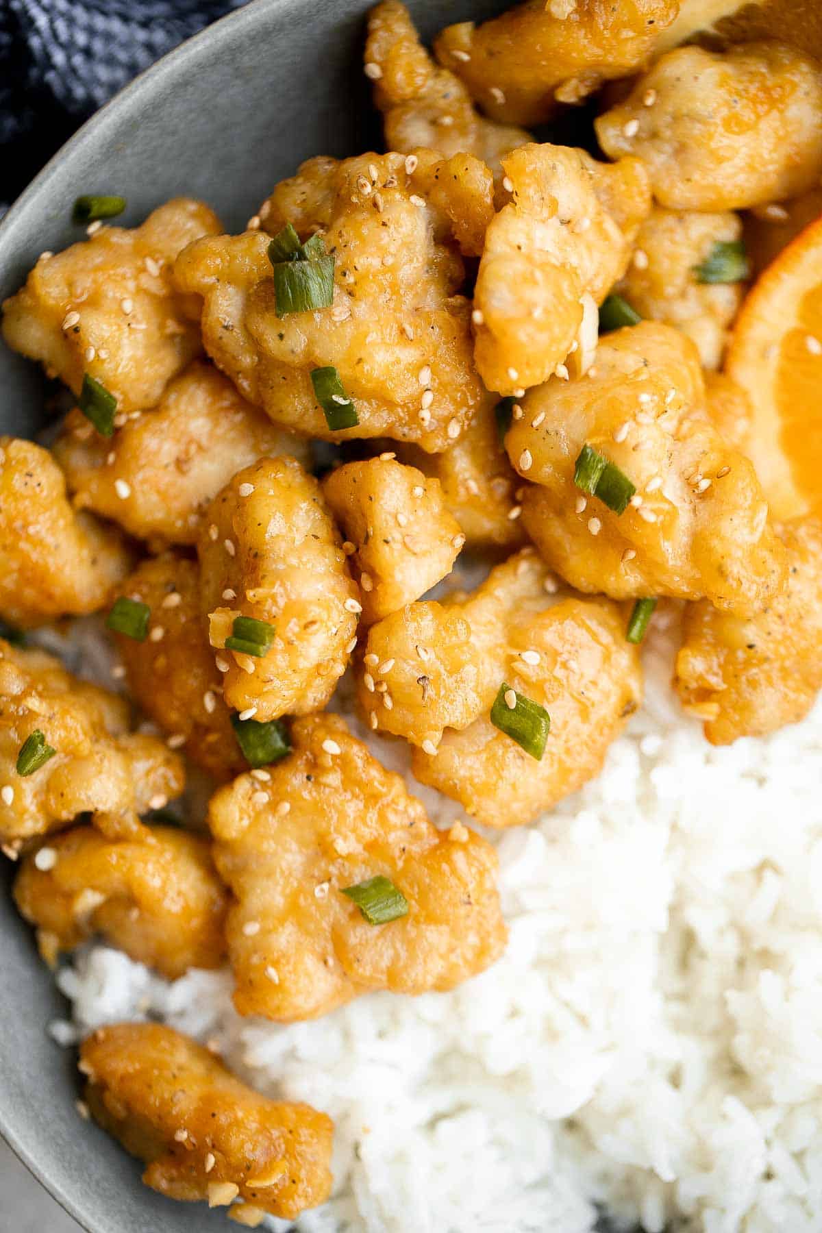 Chinese Takeout Orange Chicken is a quick, easy, delicious meal ready in 30 minutes. It’s healthier than takeout — can be pan-fried, air fried, or baked. | aheadofthyme.com