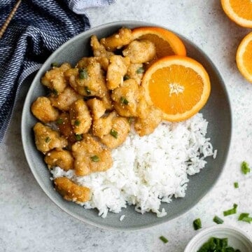 Chinese Takeout Orange Chicken is a quick, easy, delicious meal ready in 30 minutes. It’s healthier than takeout — can be pan-fried, air fried, or baked. | aheadofthyme.com