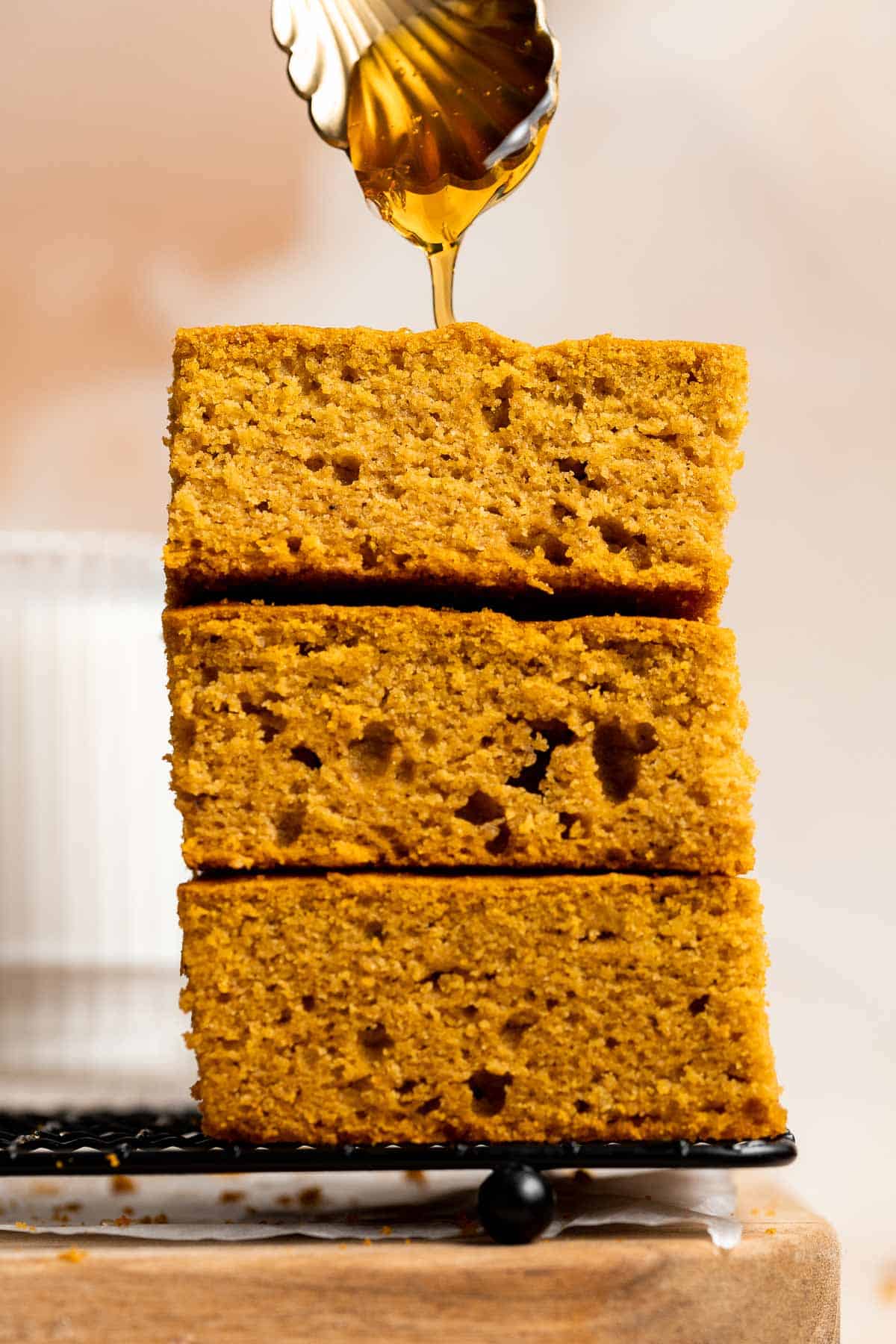 Pumpkin Cornbread is a sweet and savory side dish loaded with real pumpkin, and is moist, fluffy, and crumbly with crisp edges. | aheadofthyme.com