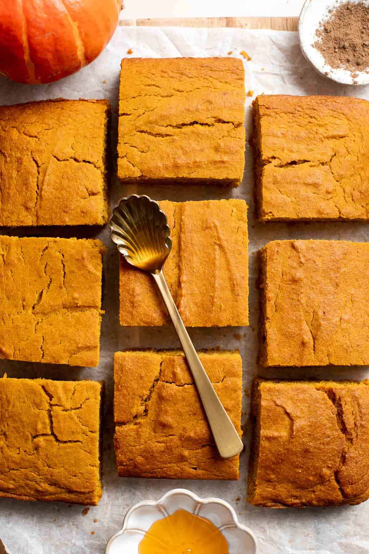 Pumpkin Cornbread is a sweet and savory side dish loaded with real pumpkin, and is moist, fluffy, and crumbly with crisp edges. | aheadofthyme.com