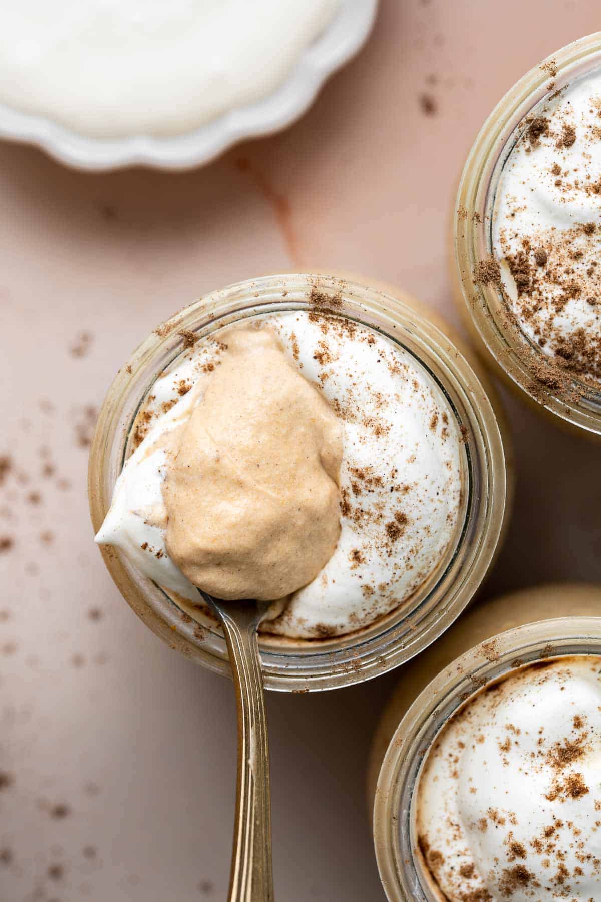 This rich, creamy pumpkin mousse is a fall dessert favorite. It’s beginner-friendly, no bake, and easy to whip up in 15 minutes before ready to chill. | aheadofthyme.com