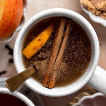 This slow cooker apple cider is quick and easy to prepare, with hints of cinnamon, cloves, allspice, and orange — a rich and flavorful fall drink. | aheadofthyme.com