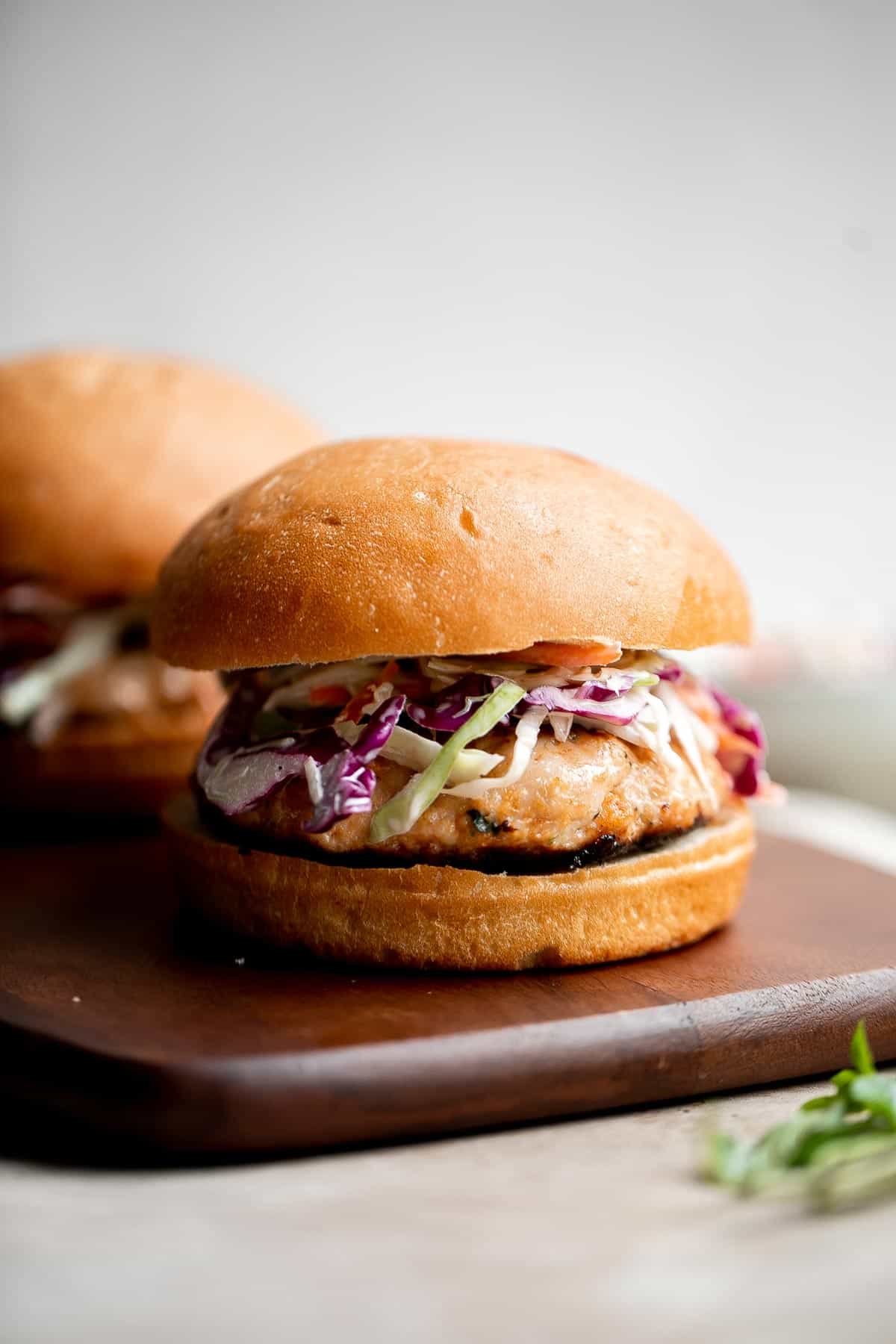 These Thai Turkey Burgers topped with a crisp and creamy slaw are loaded with fresh and bright flavors, healthy and delicious, and quick and easy to make. | aheadofthyme.com