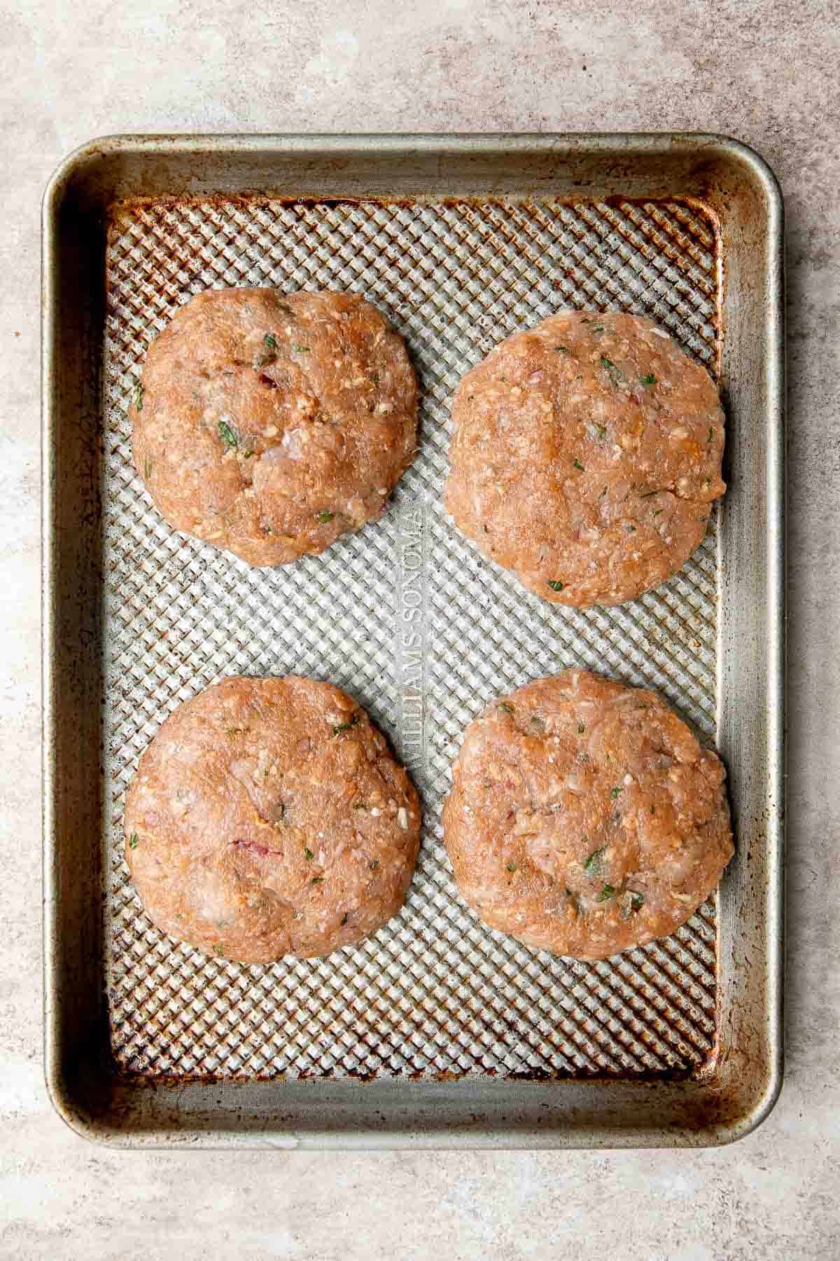 These Thai Turkey Burgers topped with a crisp and creamy slaw are loaded with fresh and bright flavors, healthy and delicious, and quick and easy to make. | aheadofthyme.com