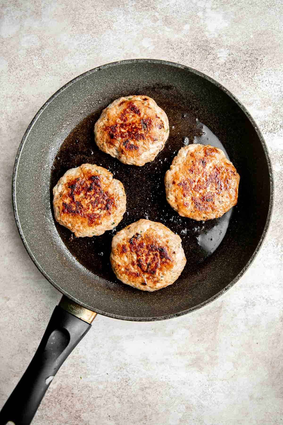 These Thai Turkey Burgers topped with a crisp and creamy slaw are loaded with fresh and bright flavors, healthy and delicious, and quick and easy to make. | aheadofthyme.com