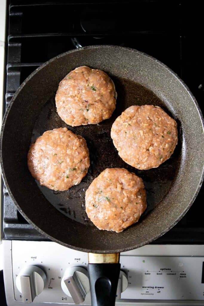 These Thai Turkey Burgers topped with a crisp and creamy slaw are loaded with fresh and bright flavors, healthy and delicious, and quick and easy to make. | aheadofthyme.com