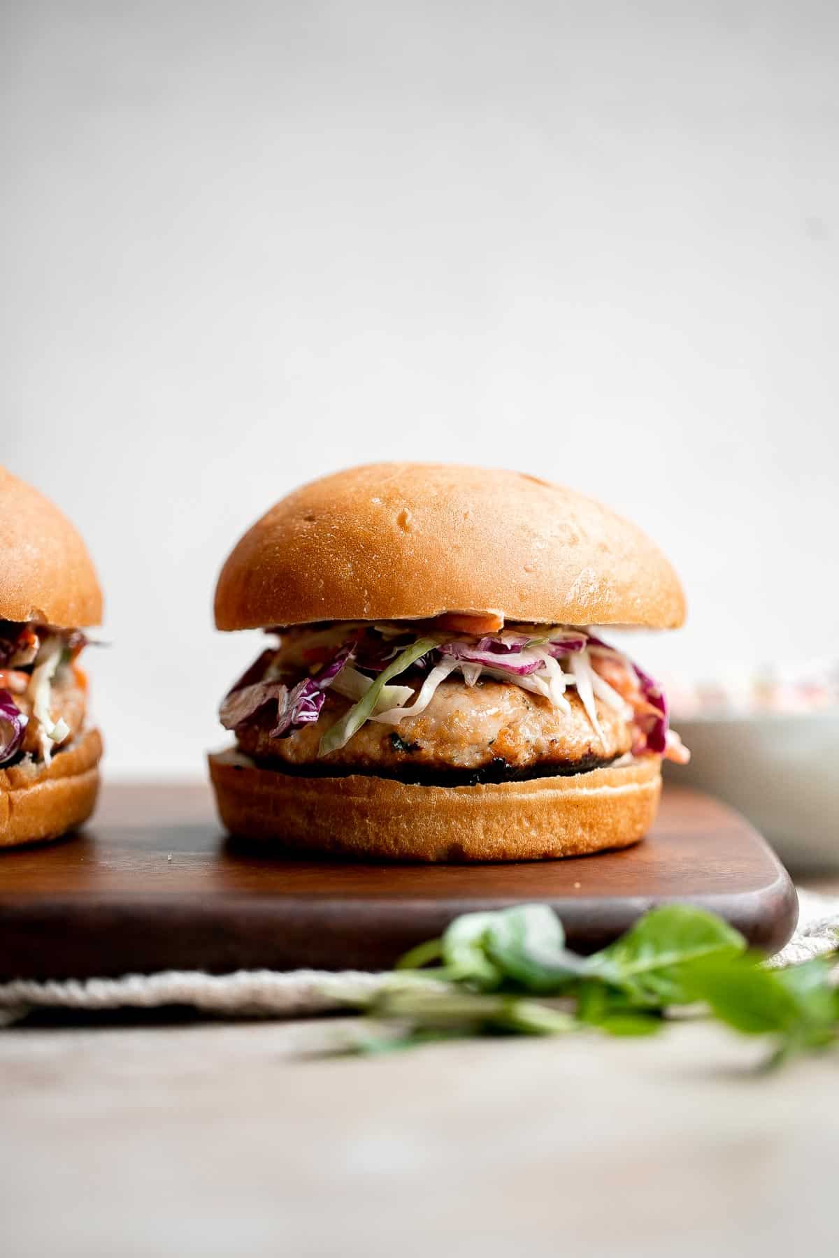 These Thai Turkey Burgers topped with a crisp and creamy slaw are loaded with fresh and bright flavors, healthy and delicious, and quick and easy to make. | aheadofthyme.com