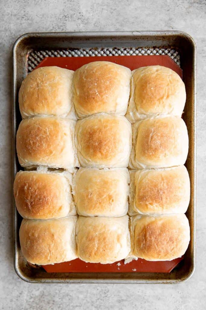 Turkey and Cheese Sliders are quick and easy, made with deli meat and Swiss cheese filled inside soft Hawaiian dinner rolls topped with a buttery sauce. | aheadofthyme.com