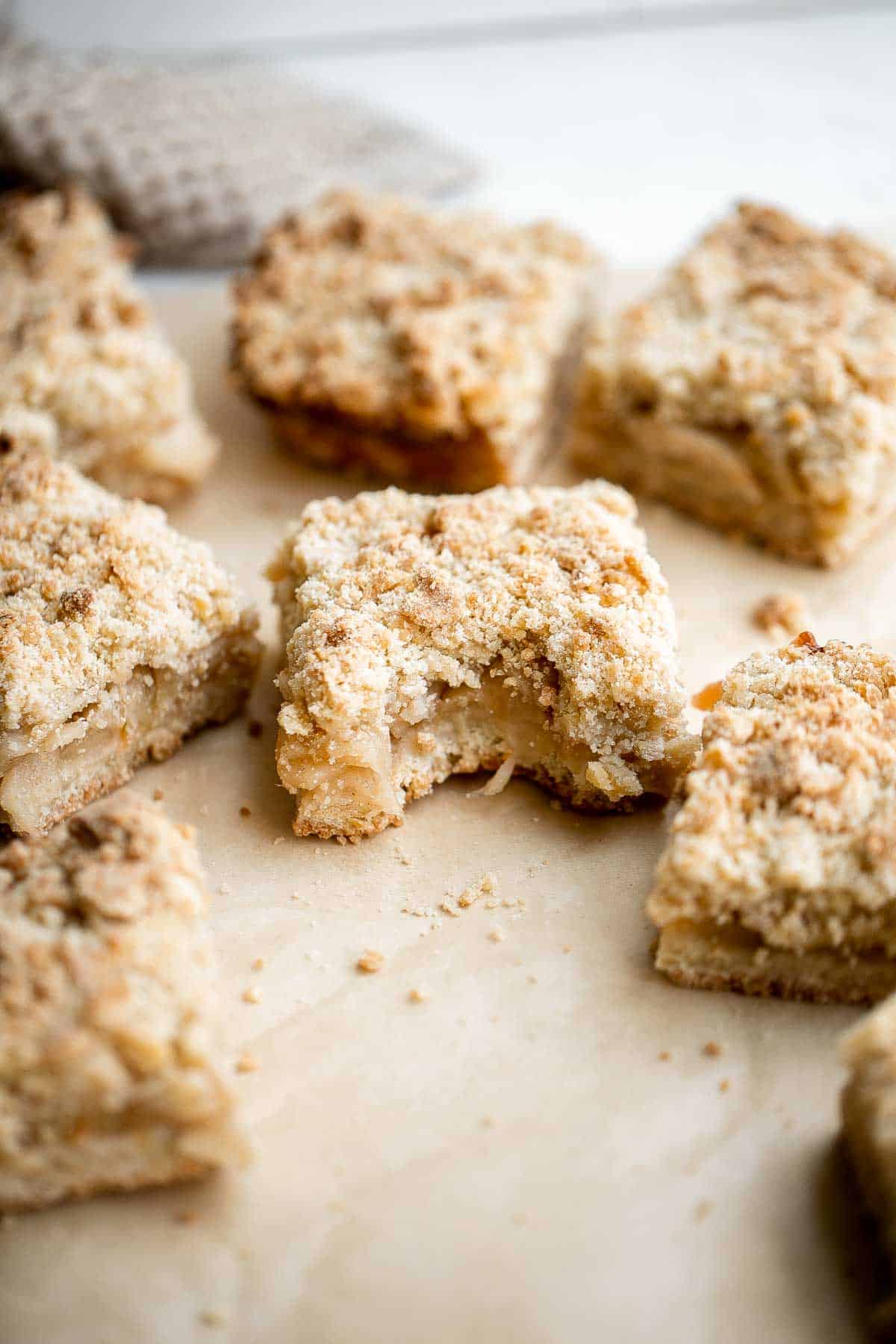 Homemade Apple Pie Bars are sweet, tart, and crumbly. With 3 delicious layers including a flaky pastry crust, cinnamon apple filling, and crumbly topping. | aheadofthyme.com