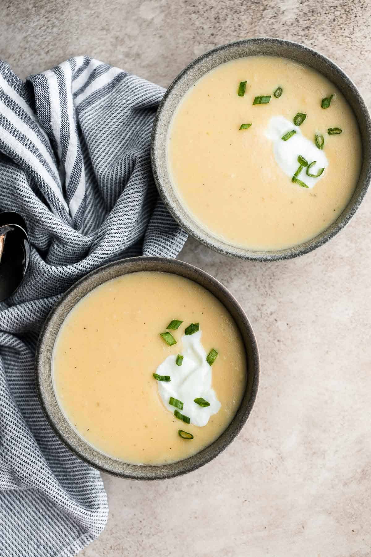 Cheesy Potato Soup is creamy, delicious, and comforting. This recipe takes everyday ingredients and transforms them in 30 minutes to a rich, luscious soup. | aheadofthyme.com